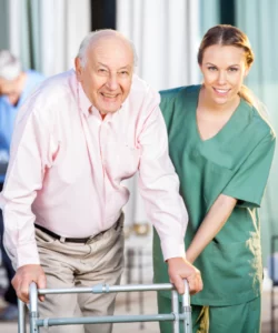Elderly Client with walker with Magnolia Adult Care Caregiver